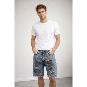 Contender brand distressed acid-wash denim shorts with ripped details. Size 38